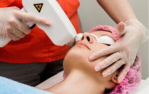 A woman getting an IPL treatment for her dry eye